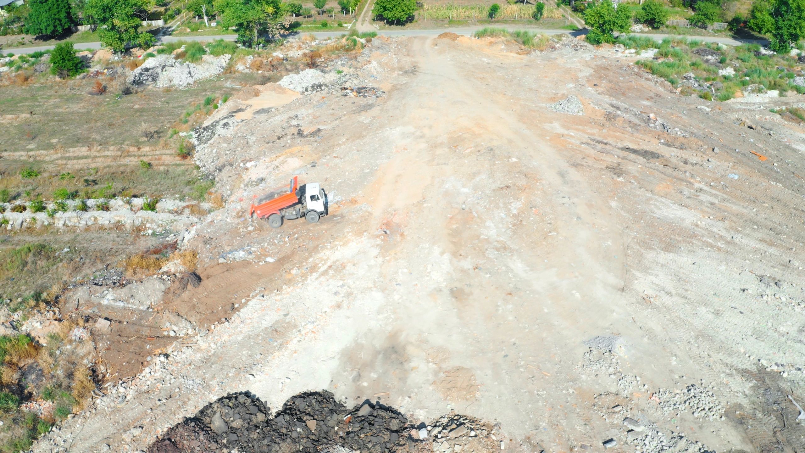 Dump truck working on a large earthmoving and development site