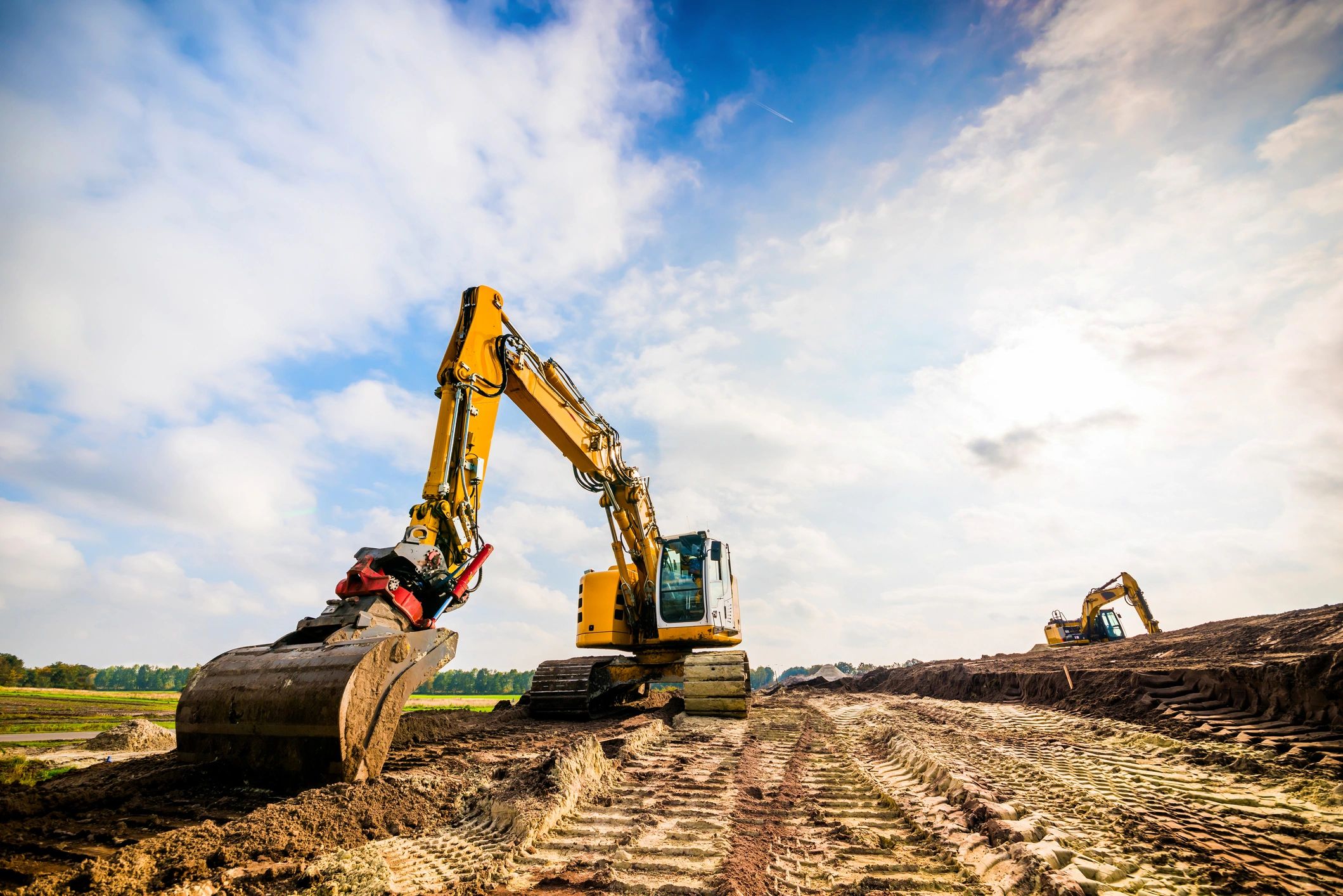 Excavator on a construction site supporting earthworks